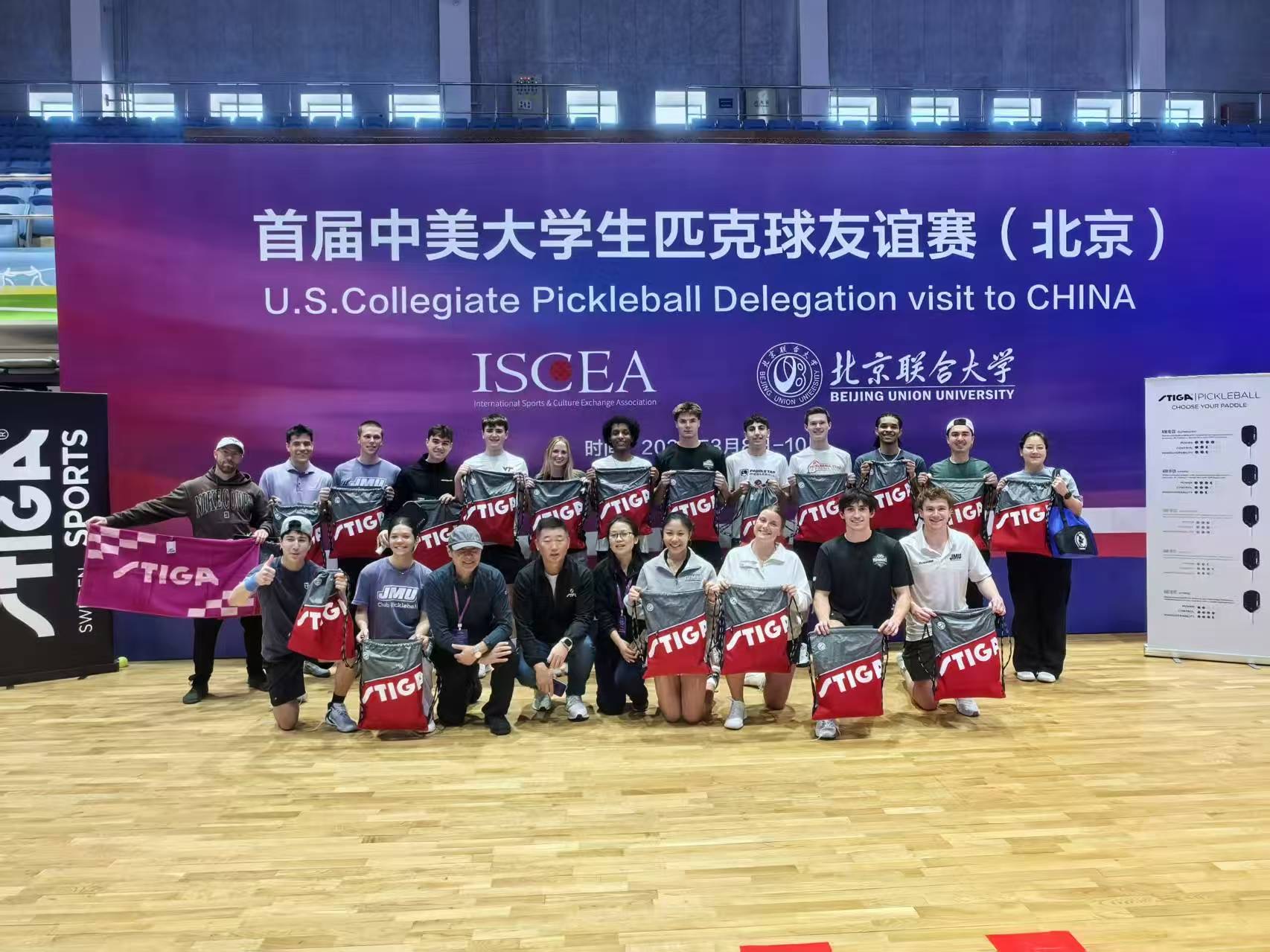 Delegation receiving STIGA gifts at the Beijing pickleball friendship event